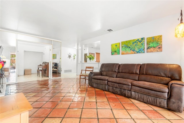 252 W Blaine St, Riverside, CA 92507 - living area featuring light tile patterned flooring