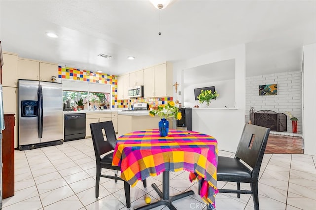 252 W Blaine St, Riverside, CA 92507 - dining area featuring a fireplace and recessed lighting