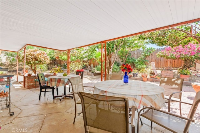 252 W Blaine St, Riverside, CA 92507 - fenced backyard with outdoor dining space and a patio area