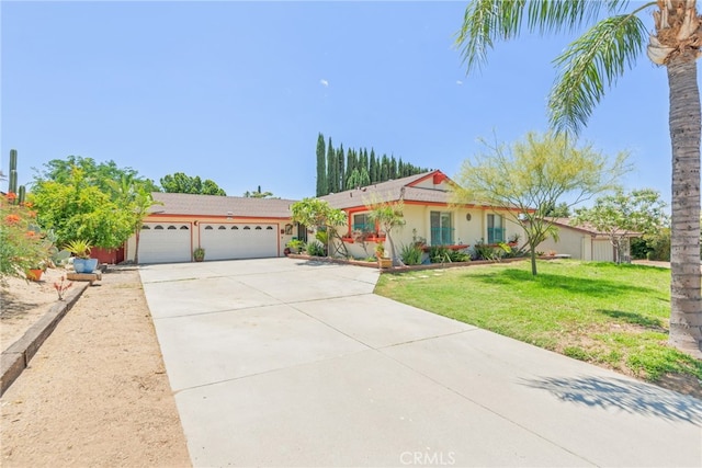 252 W Blaine St, Riverside, CA 92507 - single story home with concrete driveway, a front lawn, a garage, and stucco siding