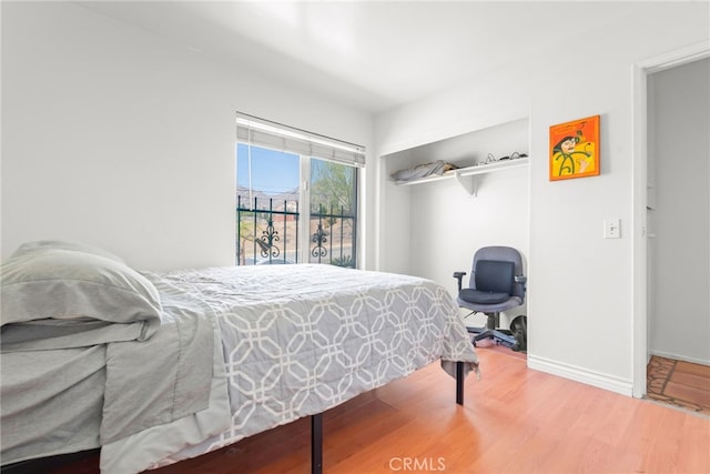 252 W Blaine St, Riverside, CA 92507 - bedroom featuring wood finished floors and baseboards