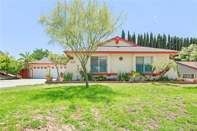 252 W Blaine St, Riverside, CA 92507 - single story home with an attached garage, a front lawn, concrete driveway, and stucco siding