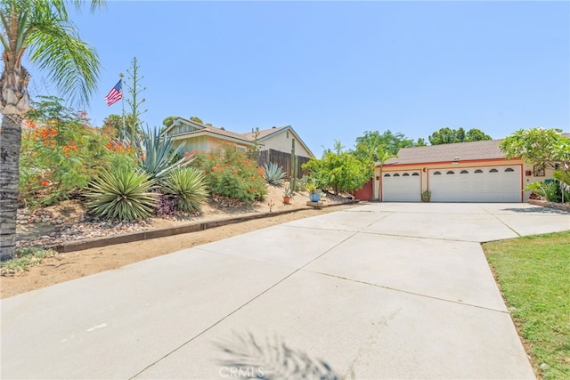 252 W Blaine St, Riverside, CA 92507 - view of front facade with driveway and a garage