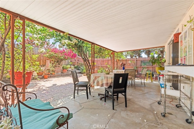 252 W Blaine St, Riverside, CA 92507 - fenced backyard featuring outdoor dining area and a patio