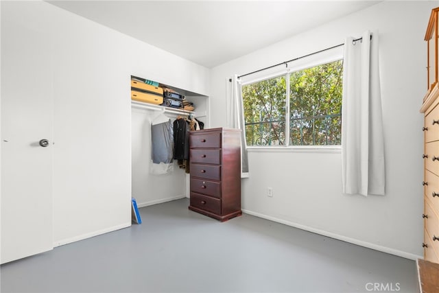 252 W Blaine St, Riverside, CA 92507 - bedroom featuring concrete floors and a closet