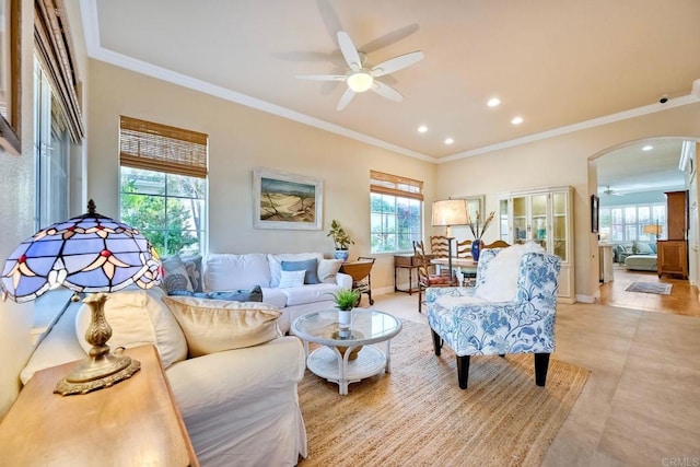 6707 Ketch Way, Carlsbad, CA 92011 - living room featuring a ceiling fan, arched walkways, crown molding, recessed lighting, and light tile patterned flooring
