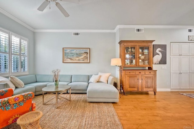 6707 Ketch Way, Carlsbad, CA 92011 - living room featuring light wood-style floors, ceiling fan, and crown molding