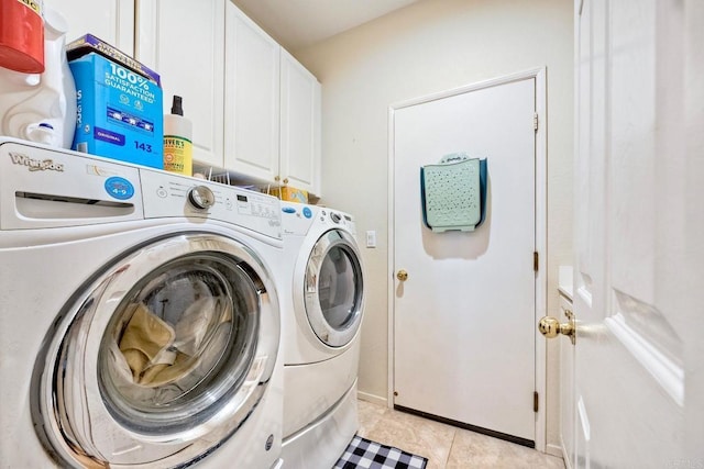 6707 Ketch Way, Carlsbad, CA 92011 - washroom with washer and dryer, cabinet space, and light tile patterned floors
