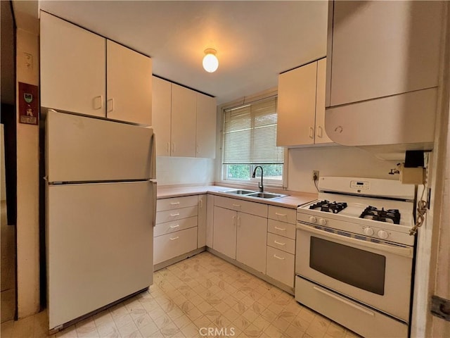 5128 W State Highway 20, Upper Lake, CA 95485 - kitchen featuring freestanding refrigerator, white range with gas cooktop, light countertops, and light flooring