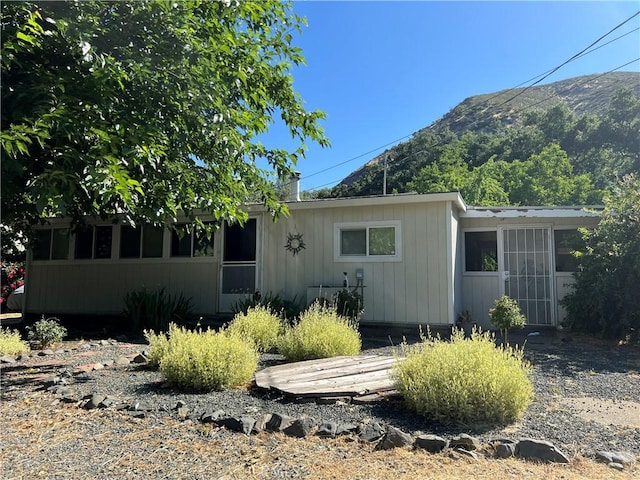5128 W State Highway 20, Upper Lake, CA 95485 - view of front of home featuring a mountain view and a sunroom