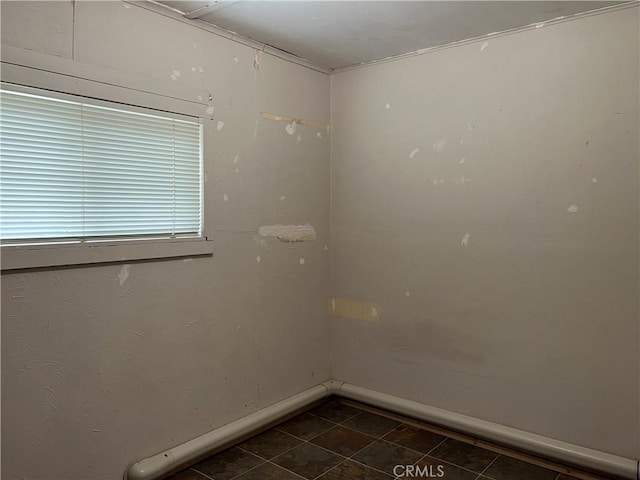 5128 W State Highway 20, Upper Lake, CA 95485 - unfurnished room with baseboards and dark tile patterned flooring