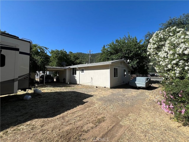 5128 W State Highway 20, Upper Lake, CA 95485 - back of house with dirt driveway