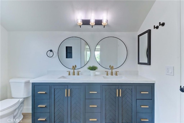 8312 Bellhaven St, La Palma, CA 90623 - bathroom featuring double vanity and toilet