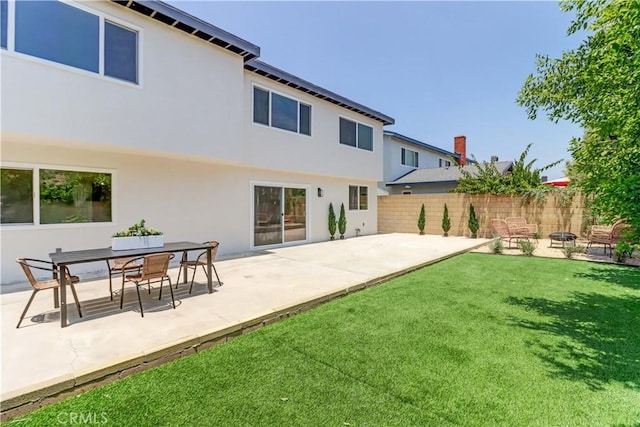 8312 Bellhaven St, La Palma, CA 90623 - rear view of property with a patio and stucco siding