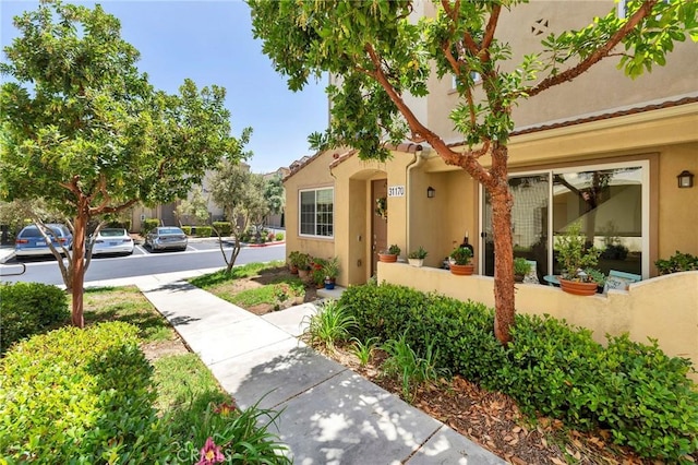 31170 Strawberry Tree Ln Unit 67, Temecula, CA 92592 - view of front of property featuring stucco siding