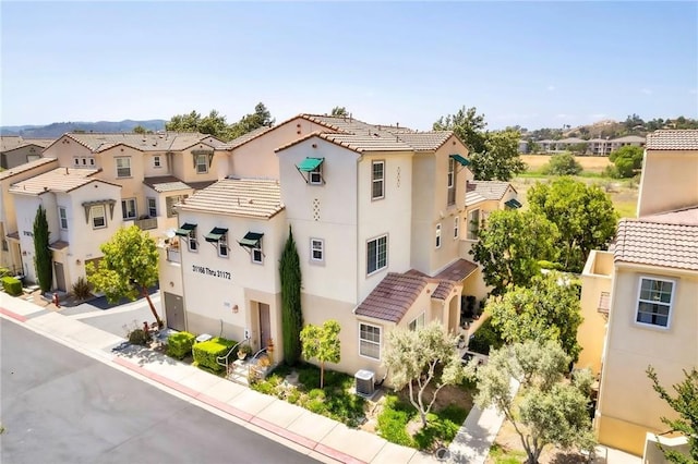 31170 Strawberry Tree Ln Unit 67, Temecula, CA 92592 - view of building exterior with a residential view