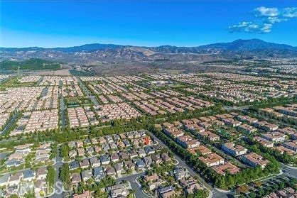 62 Gentry, Irvine, CA 92620 - aerial perspective of suburban area with a mountainous background