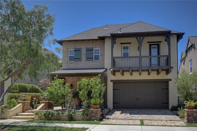 62 Gentry, Irvine, CA 92620 - view of front of house with an attached garage, a balcony, driveway, and stucco siding