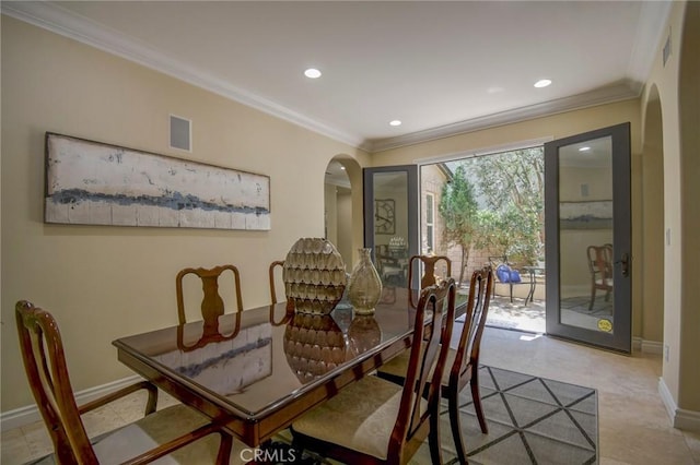 62 Gentry, Irvine, CA 92620 - dining area featuring arched walkways, crown molding, and recessed lighting