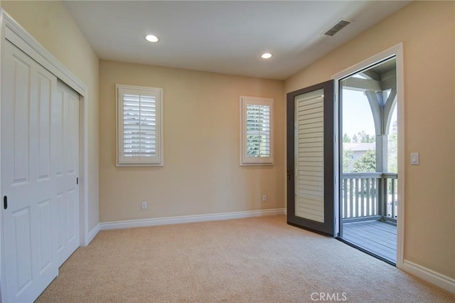 62 Gentry, Irvine, CA 92620 - unfurnished bedroom featuring light colored carpet, access to outside, and recessed lighting