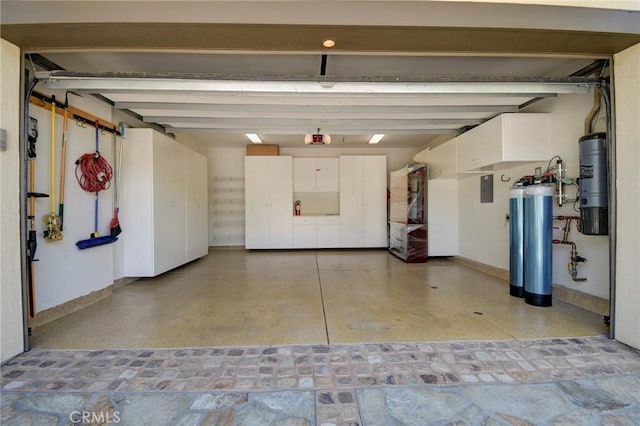 62 Gentry, Irvine, CA 92620 - garage featuring electric panel and a garage door opener