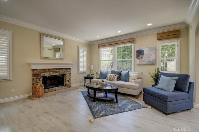 62 Gentry, Irvine, CA 92620 - living room with wood finished floors, ornamental molding, a fireplace, and recessed lighting