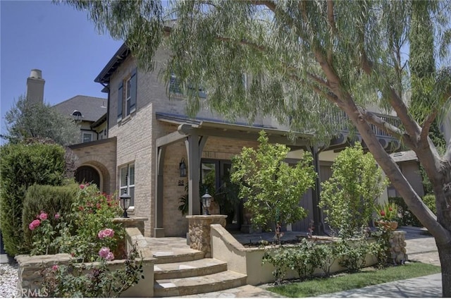 62 Gentry, Irvine, CA 92620 - view of front of home featuring brick siding