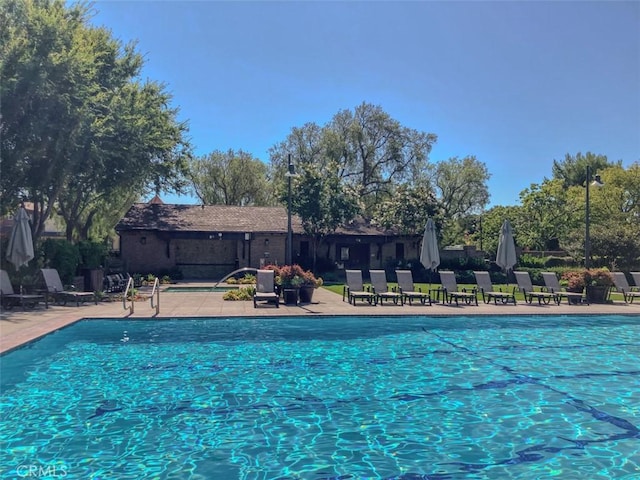 62 Gentry, Irvine, CA 92620 - community pool featuring a patio area