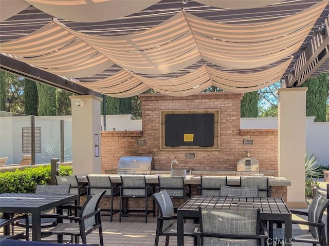 62 Gentry, Irvine, CA 92620 - view of patio with area for grilling and outdoor dining area