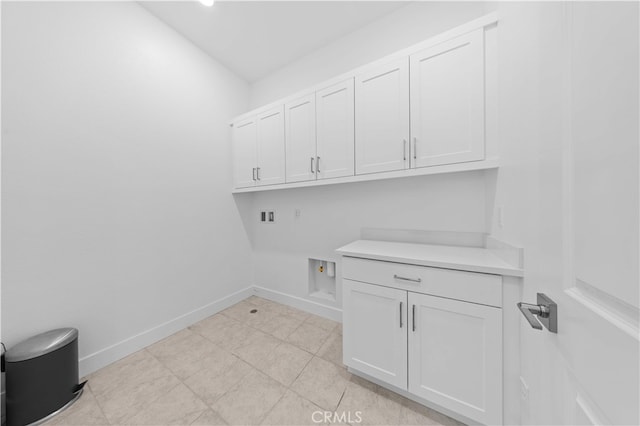 27216 W Coyote Bush Ct, Valencia, CA 91355 - laundry room featuring cabinet space and washer hookup