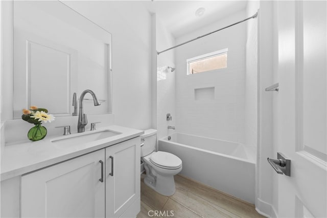 27216 W Coyote Bush Ct, Valencia, CA 91355 - full bathroom featuring wood finished floors, vanity, and shower / bathtub combination