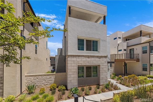 27216 W Coyote Bush Ct, Valencia, CA 91355 - view of front of property with stucco siding