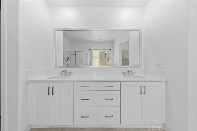 27216 W Coyote Bush Ct, Valencia, CA 91355 - bathroom with double vanity and a shower stall