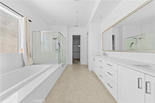 27216 W Coyote Bush Ct, Valencia, CA 91355 - bathroom featuring a stall shower, a bath, double vanity, and tile patterned flooring