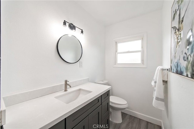 2058 N Pico Ave, San Bernardino, CA 92411 - bathroom featuring vanity and wood finished floors