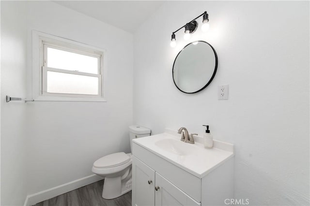 2058 N Pico Ave, San Bernardino, CA 92411 - half bathroom with vanity and wood finished floors