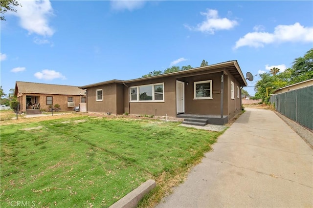 2058 N Pico Ave, San Bernardino, CA 92411 - view of front facade featuring stucco siding and driveway