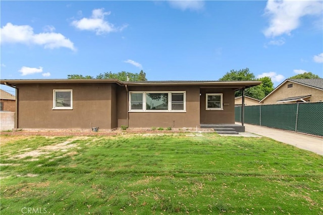 2058 N Pico Ave, San Bernardino, CA 92411 - view of front of home featuring stucco siding and concrete driveway