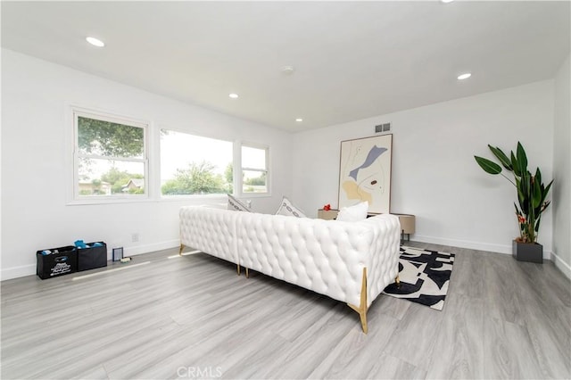 2058 N Pico Ave, San Bernardino, CA 92411 - bedroom with wood finished floors and recessed lighting