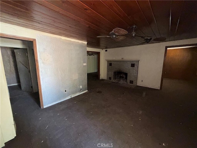 2915 Lanning Ave, Redding, CA 96001 - unfurnished living room with ceiling fan, a brick fireplace, and wood ceiling