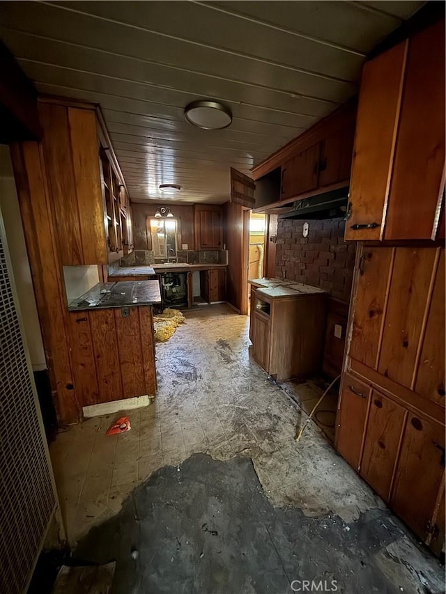 2915 Lanning Ave, Redding, CA 96001 - kitchen featuring brown cabinets and a heating unit
