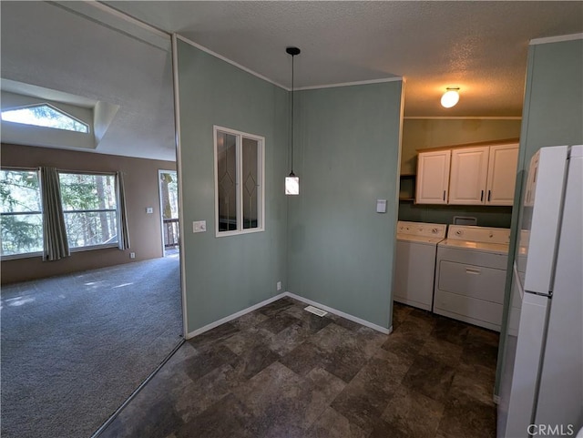 16121 Golf Rd, Cobb, CA 95426 - kitchen featuring freestanding refrigerator, washer and dryer, a textured ceiling, decorative light fixtures, and open floor plan