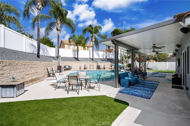 9228 Whiting Way, Riverside, CA 92508 - fenced backyard featuring ceiling fan and a patio area