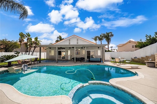 9228 Whiting Way, Riverside, CA 92508 - view of pool featuring a patio area, ceiling fan, a pool with connected hot tub, and outdoor dining area