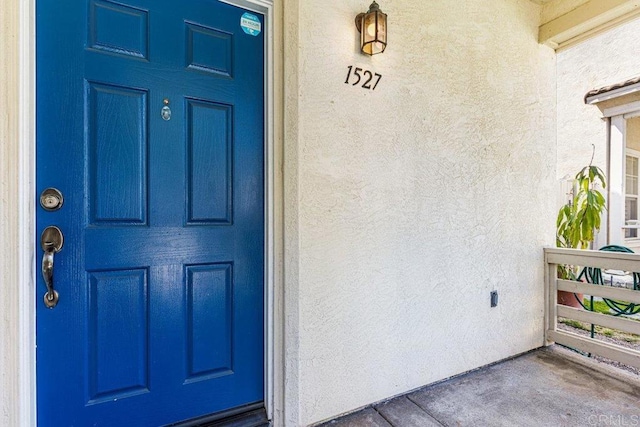 1527 Gold Run Rd, Chula Vista, CA 91913 - property entrance with stucco siding
