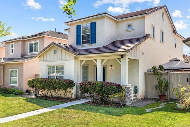 1527 Gold Run Rd, Chula Vista, CA 91913 - view of front of home with a tile roof, stucco siding, and covered porch