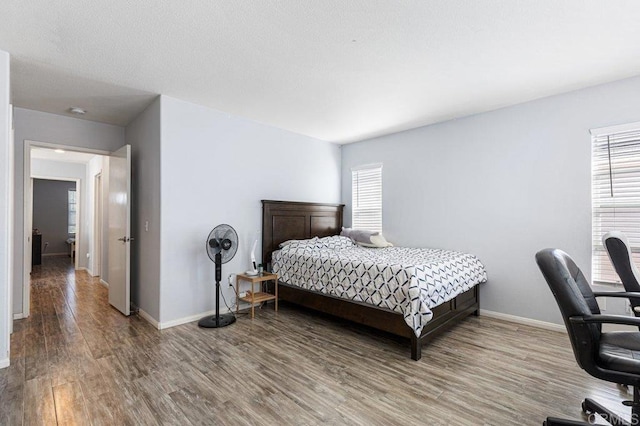 1527 Gold Run Rd, Chula Vista, CA 91913 - bedroom featuring wood finished floors and an office area