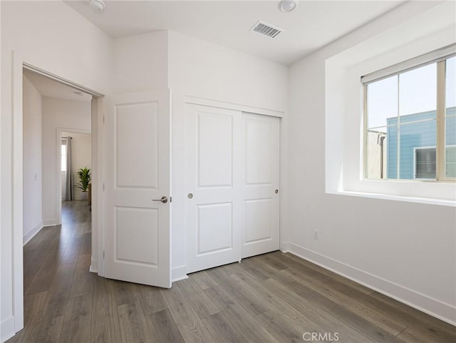 1673 Lexington Ln, San Pedro, CA 90732 - unfurnished bedroom featuring wood finished floors and a closet