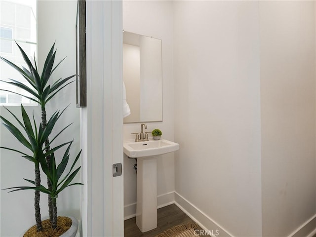 1673 Lexington Ln, San Pedro, CA 90732 - bathroom featuring baseboards and wood finished floors