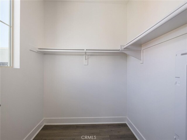 1673 Lexington Ln, San Pedro, CA 90732 - walk in closet with dark wood-style flooring and a heating unit